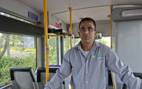 Rajnish Trehan, the former AT bus driver who was punched in a racist attack in September 2024. Trehan has since left his old job out of safety concerns, and is now driving school buses.