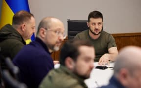 A handout picture taken and released by the Ukrainian presidential press-service on 2 April, 2022 shows president Volodymyr Zelensky holding a meeting with the economic blocs of the Office of the Head of State and the Cabinet of Ministers.