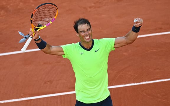Spain's Rafael Nadal celebrates after winning against Italy's Jannik Sinner during their men's singles fourth round tennis match at the French Open tennis tournament in Paris on June 7, 2021.
