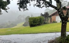 Surface flooding in Orewa as thunderstorms, lightning and heavy rain hit Auckland.