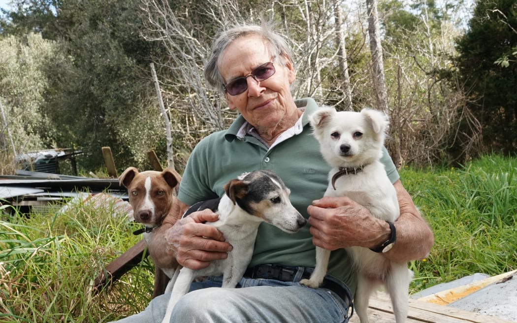Arnold Kalnins, 80, and his puppies survived a blaze that destroyed his home near Kaikohe.