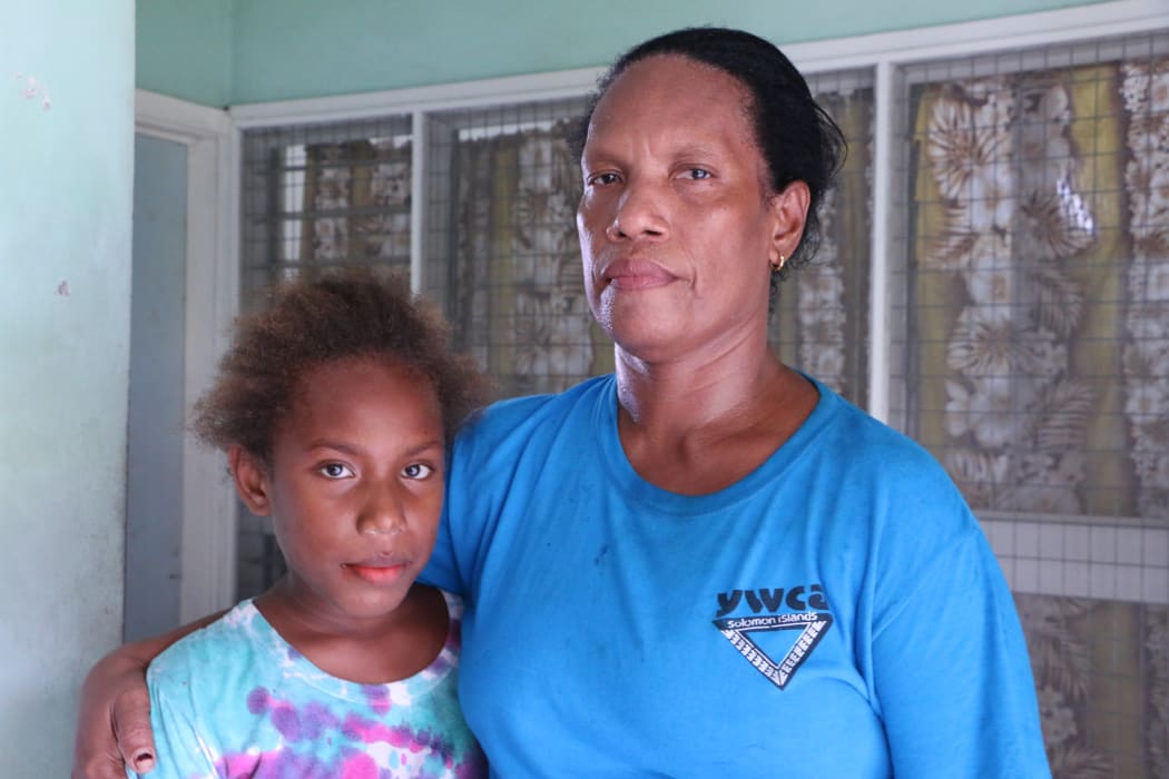Anthonia Deve and her daughter Janice. Mrs Deve says its the uncertainty more than anything that troubles her about RAMSI's departure.