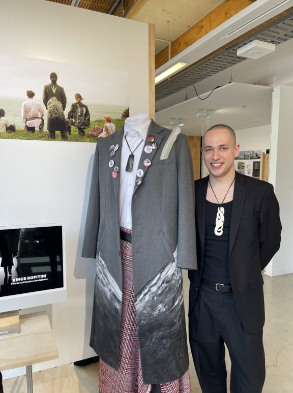 Vince Ropitini with a piece from his designs.