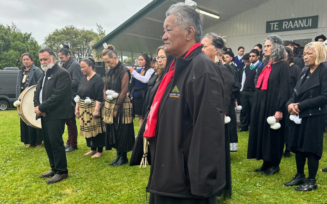 Members of the iwi of Taranaki preparing to welcome the king to Parihaka.