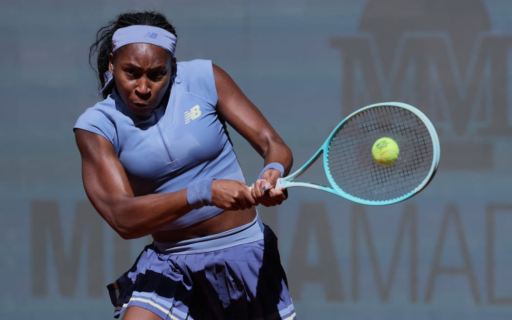US Coco Gauff returns the ball to Switzerland’s Belinda Bencic during their 2025 WTA Tour Madrid Open tennis tournament fourth round singles match, 28 April, 2025.