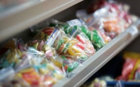 Lollies on a dairy shelf