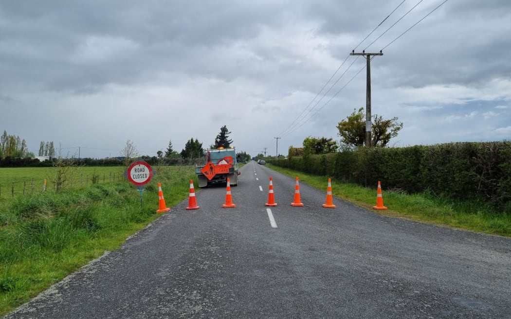 Road blocked off near the large fires in houses and farm buildings in South Wairarapa.