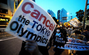 People stage a demonstration as they demand Tokyo Olympics to cancelled due to coronavirus pandemic in Tokyo, Japan on 9 May 2021.