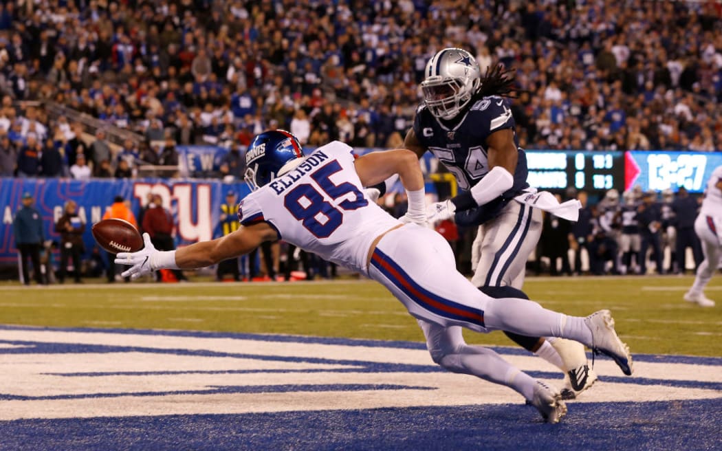 Rhett Ellison #85 of the New York Giants in action against Jaylon Smith #54 of the Dallas Cowboys at MetLife Stadium.
