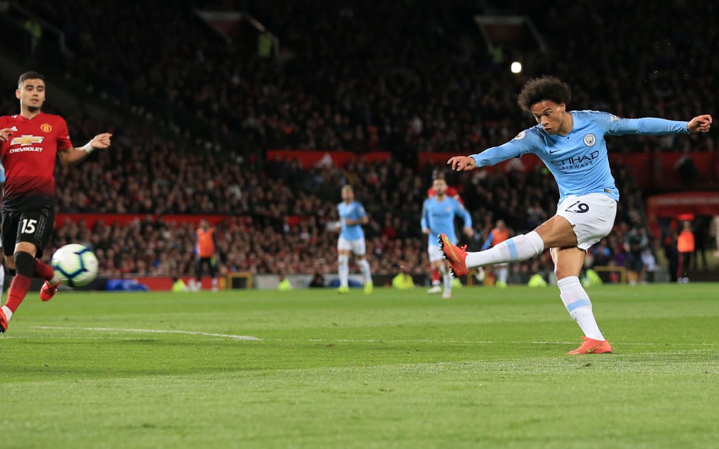 Leroy Sane adds a second for City in the Manchester derby.