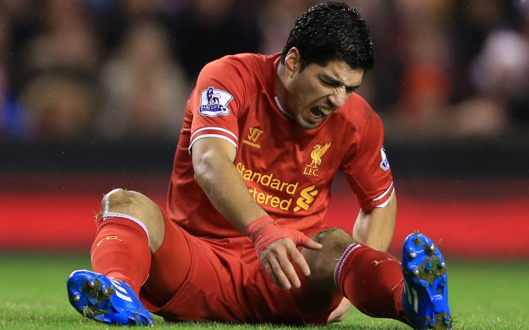 Luis Suarez playing for Liverpool.