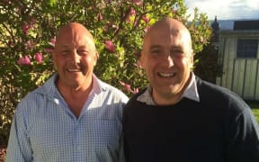Bryan Cadogan, left, and younger brother Tim Cadogan yesterday as they celebrated the results.