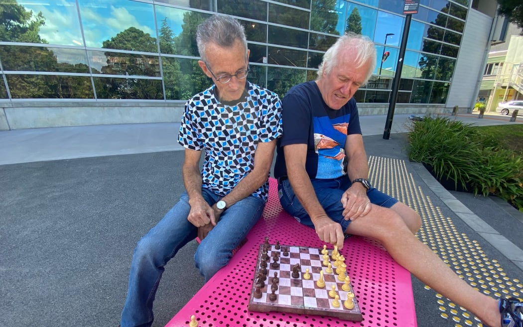 Whangārei Chess Club’s Greg Waite (left) and Brian Cox are forced to play their favourite game outside Whangārei central library after it closed on Sundays, the club losing its monthly gathering venue at the civic facility as a result