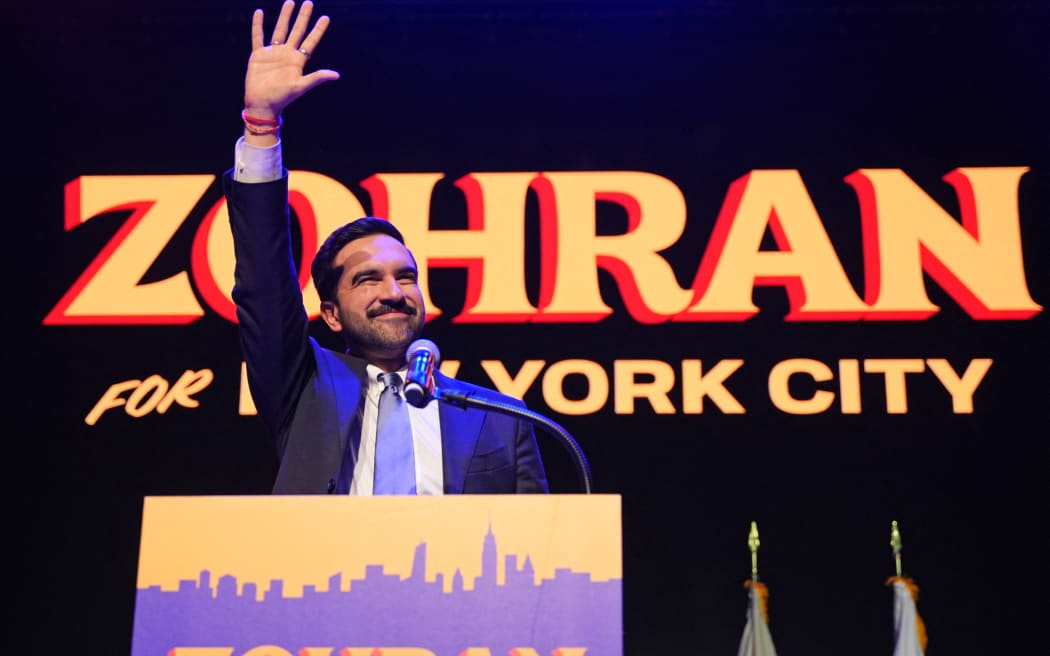 New York City Mayoral candidate Zohran Mamdani celebrates during an election night event at the Brooklyn Paramount Theater in Brooklyn, New York on November 4, 2025. New Yorkers elected leftist Zohran Mamdani as their next mayor November 4, 2025 broadcasters projected, on a day of key local ballots across the country offering the first electoral judgement of Donald Trump's tumultuous second White House term. (Photo by Angelina Katsanis / AFP)