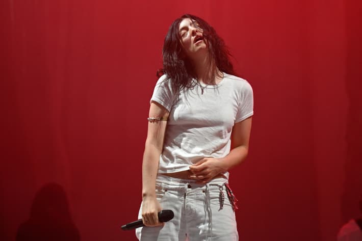 New Zealand singer-songwriter Lorde performs on the Woodsies Stage on the third day of the Glastonbury festival at Worthy Farm in the village of Pilton in Somerset, south-west England, on June 27, 2025.
