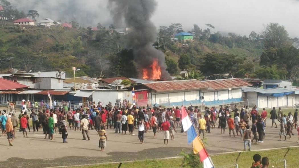 Security forces fired warning shots to disperse a crowd of about 200 after they reportedly disrupted an Islamic prayer meeting and attacked a mosque in Tolikara, Papua.