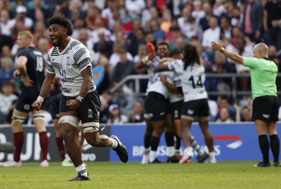 Fiji players celebrate after the whistle at the World Cup warm-up match between England and Fiji at Twickenham Stadium on 26 August.