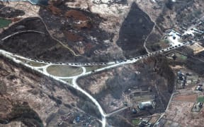 Satellite image taken by private satellite company Maxar shows that the 64-km long Russian military convoy reached outskirts of Kharkov, Ukraine, on Monday Feb 28, 2022.