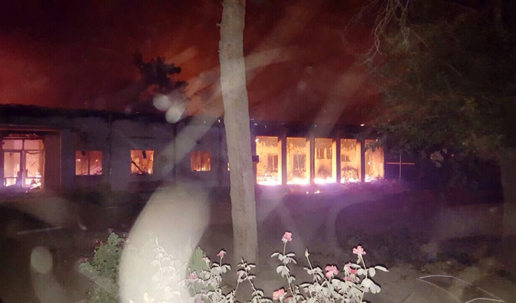 A photo released by MSF showing fires burning in part of the hospital which was hit after an air strike.