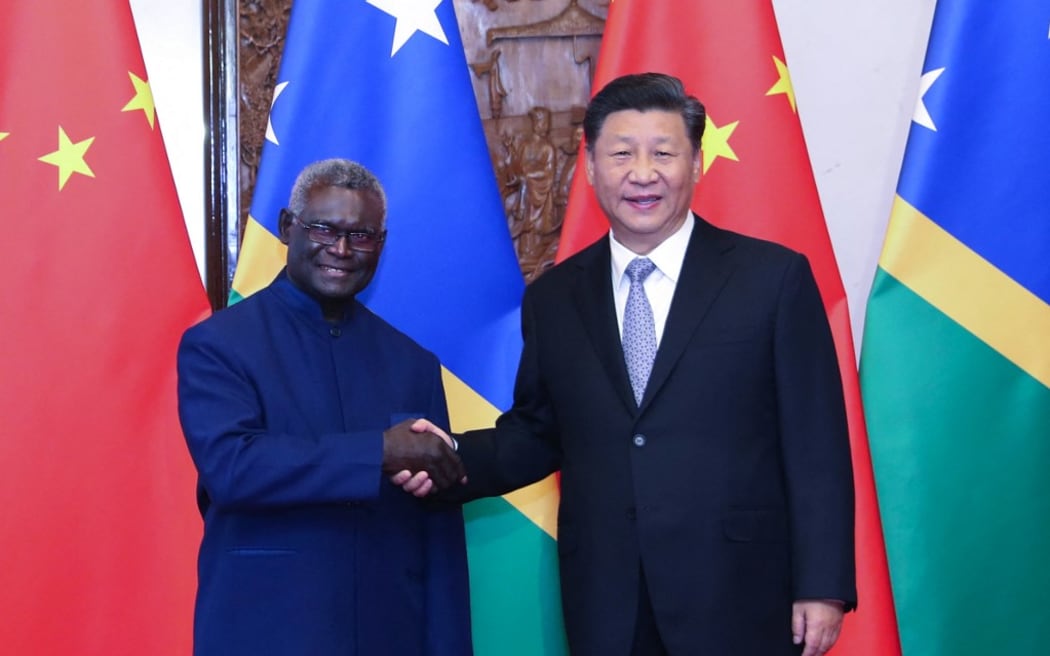 (191009) -- BEIJING, Oct. 9, 2019 (Xinhua) -- Chinese President Xi Jinping meets with Solomon Islands' Prime Minister Manasseh Sogavare at the Diaoyutai State Guesthouse in Beijing, capital of China, Oct. 9, 2019. (Xinhua/Yao Dawei) (Photo by YAO DAWEI / XINHUA / Xinhua via AFP)