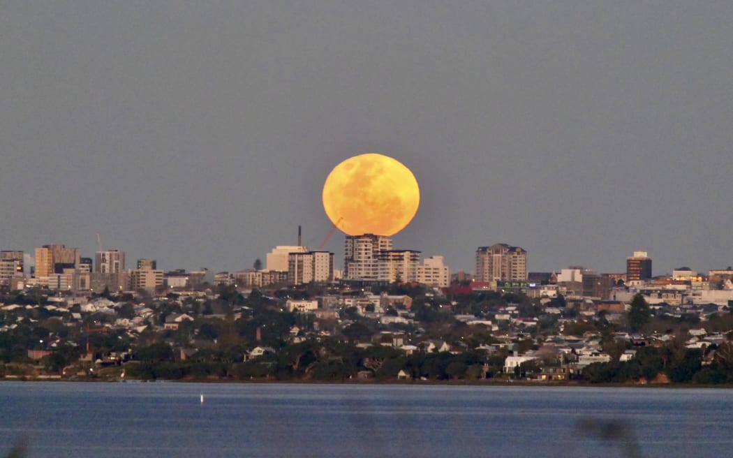 The super blue moon, as seen from Auckland's Te Atatu, above Harbourview Beach.