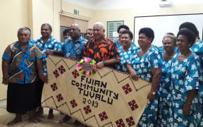 Prime Minister Frank Bainimarama with members of the Fijian community in Tuvalu.
