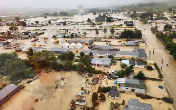 Flooding in Wairoa after the river burst its banks due to heavy rain from Cyclone Gabrielle.