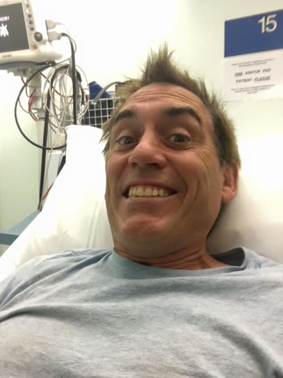 Jason Gunn in hospital bed