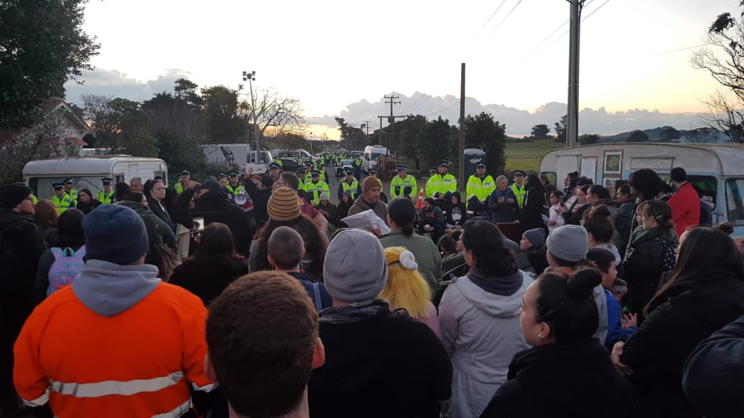 Protesters and police at Ihumatao.