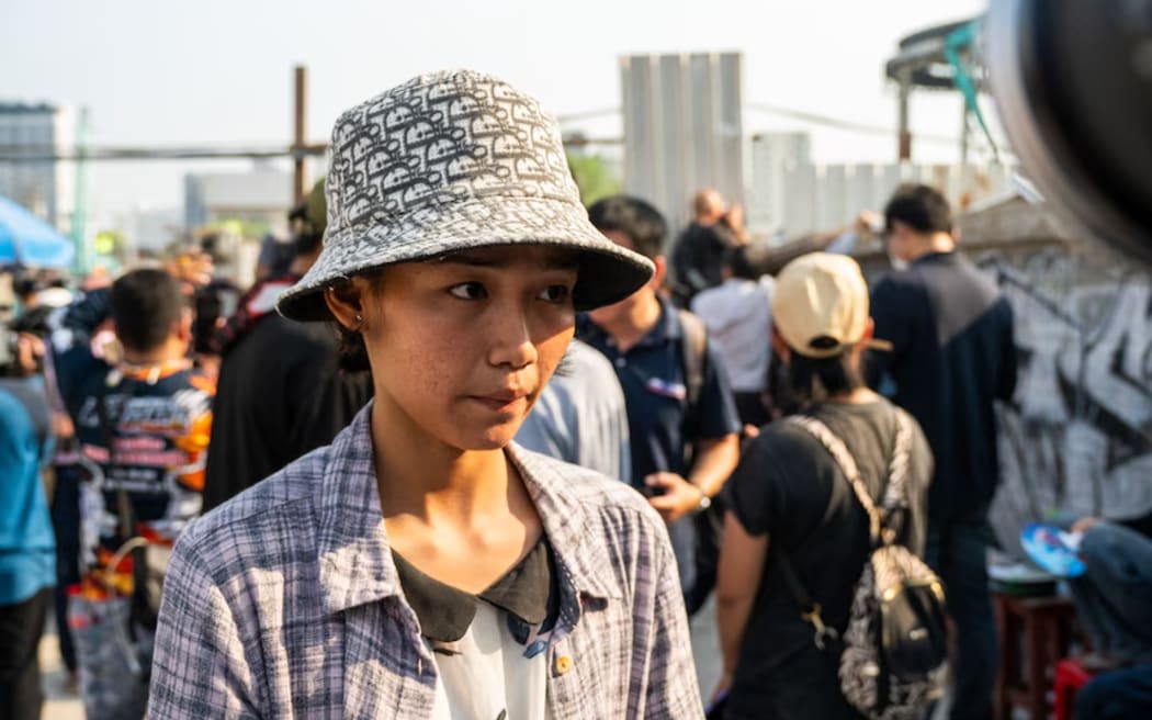 Nul's family is from Cambodia and came to Bangkok in the hope of earning a better living. Now she is waiting on news of her brother.