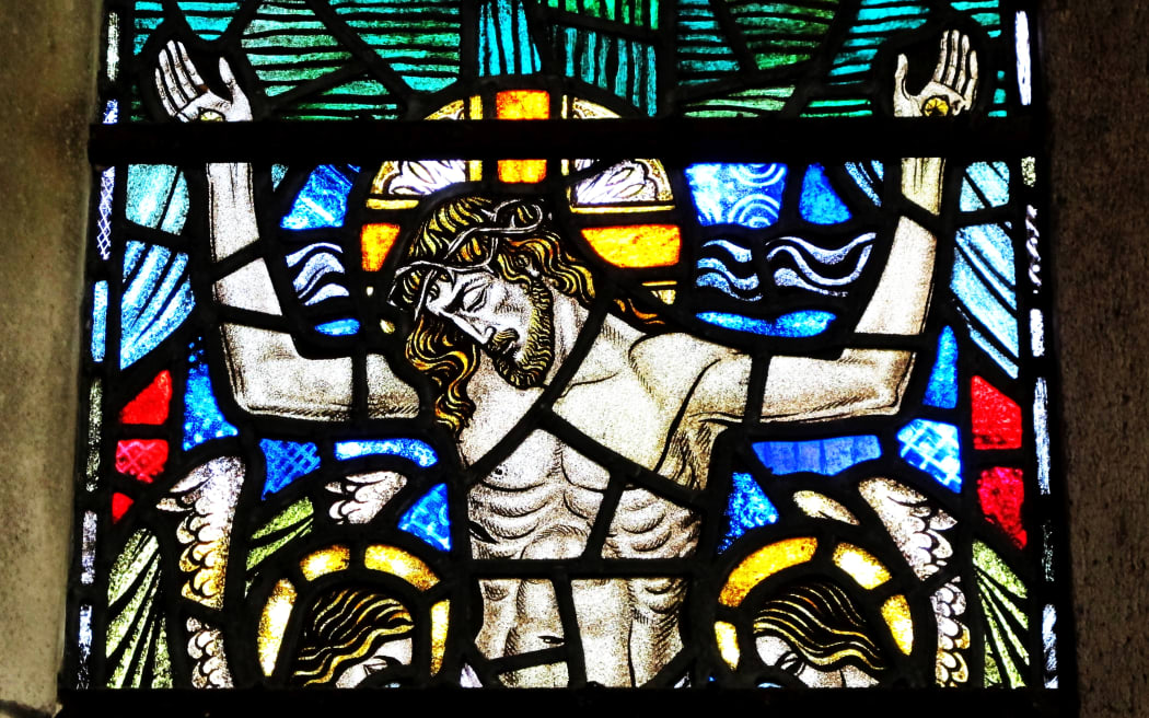 Stained glass depicting crucified Christ at St Luke's Church, Remuera, Auckland.