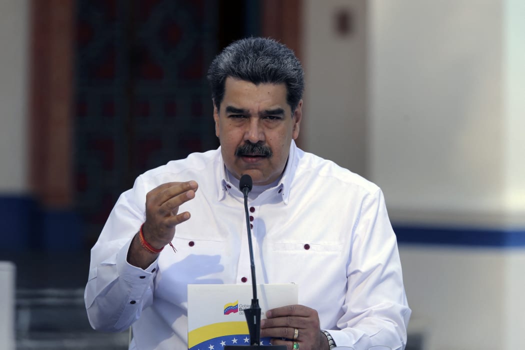 Venezuela's President Nicolas Maduro speaking  during a broadcast message at Miraflores Presidential Palace in Caracas on 4 April 2021.