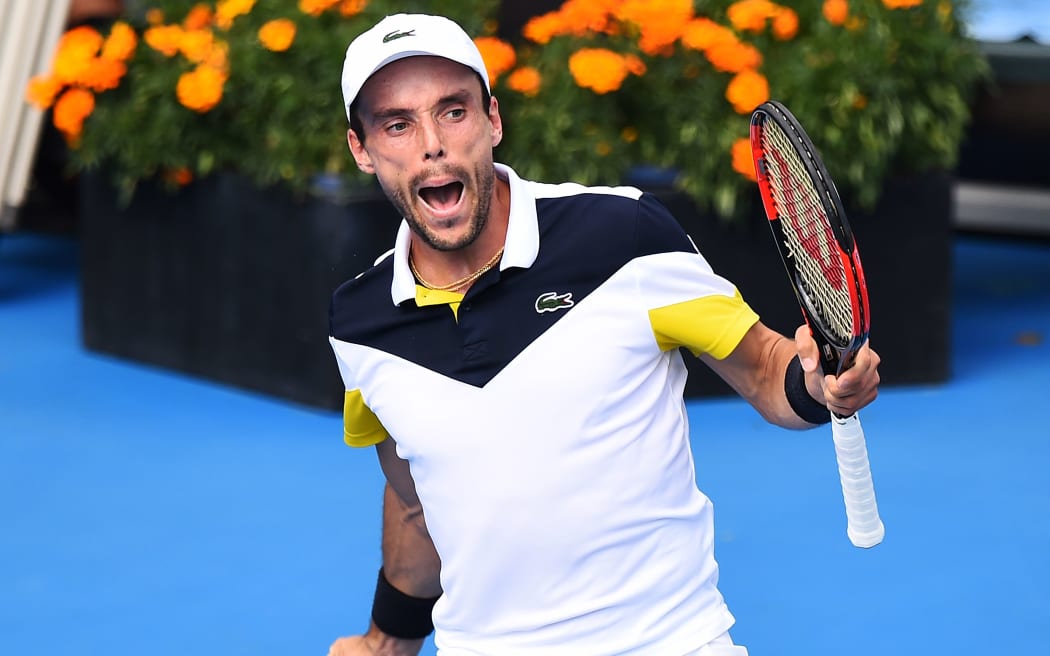 Roberto Bautista Agut celebrates victory at the ASB Classic in 2018.