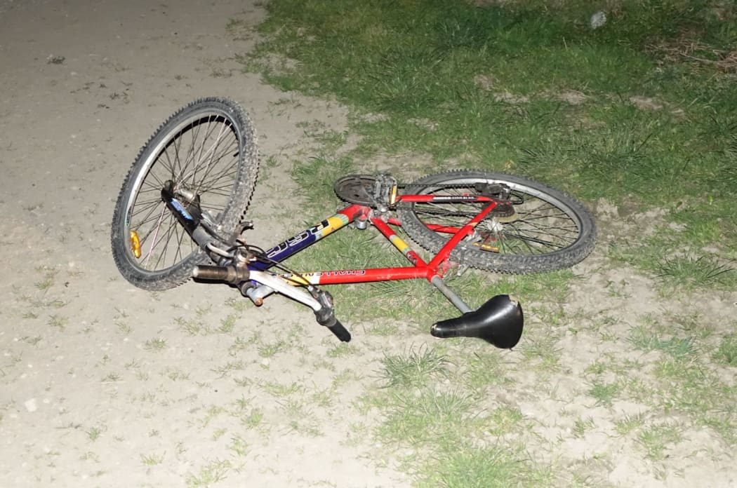 Ashburton shooting suspect Russell John Tully's bike lies abandoned on the side of the road.