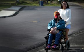 Caregiver Alicia Wong and her mother Kai.