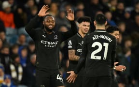 Manchester City's Ghanaian midfielder #42 Antoine Semenyo (L) celebrates with Manchester City's Algerian defender #21 Rayan Ait-Nouri (R) after scoring the opening goal of the English Premier League football match between Leeds United and Manchester City at Elland Road in Leeds, northern England on February 28, 2026. (Photo by Oli SCARFF / AFP) / RESTRICTED TO EDITORIAL USE. NO USE WITH UNAUTHORIZED AUDIO, VIDEO, DATA, FIXTURE LISTS, CLUB/LEAGUE LOGOS OR 'LIVE' SERVICES. ONLINE IN-MATCH USE LIMITED TO 120 IMAGES. AN ADDITIONAL 40 IMAGES MAY BE USED IN EXTRA TIME. NO VIDEO EMULATION. SOCIAL MEDIA IN-MATCH USE LIMITED TO 120 IMAGES. AN ADDITIONAL 40 IMAGES MAY BE USED IN EXTRA TIME. NO USE IN BETTING PUBLICATIONS, GAMES OR SINGLE CLUB/LEAGUE/PLAYER PUBLICATIONS. /