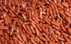A photo of Drugmaker Merck's Covid-19 molnupiravir pills.