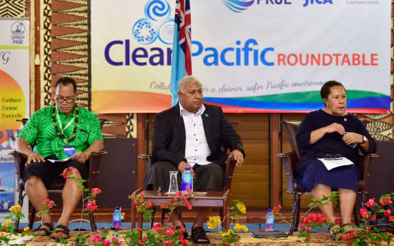 SPREP Director General, Kosi Latu (L), Fiji's Prime Minister Frank Bainimarama (C), Pacific Islands Forum Secretary-General Dame Meg Taylor (R) at the opening of the Clean Pacific Roundtable in Suva, August 2018