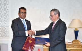 Yogesh Karan from the Fiji Prime Minister's Office and Indonesia's Permanent UN representative in New York, Dian Triansyah Djani