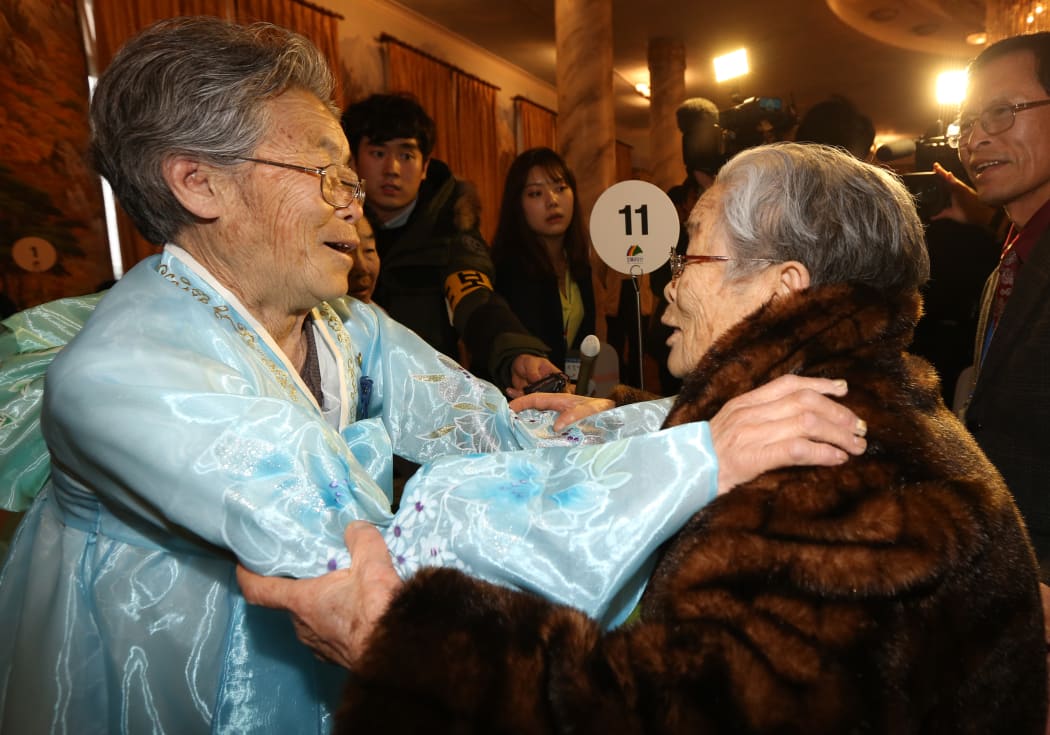 Kim Seok-Ryo (left) of North Korea, who's 80, is reunited with her sister Kim Song-Yun, 96, of South Korea.