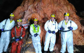 Geotechnical engineer Rick Lee, mine worker Luke Taylor, chief operating officer Dinghy Pattinson, mine manager / health and safety manager Greg Duncan, and mine maintenance planner Liam Collins at the Rocsil Plug.