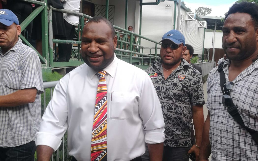 Papua New Guinea government MP James Marape outside the national court in Waigani after an electoral petition against him was dismissed.