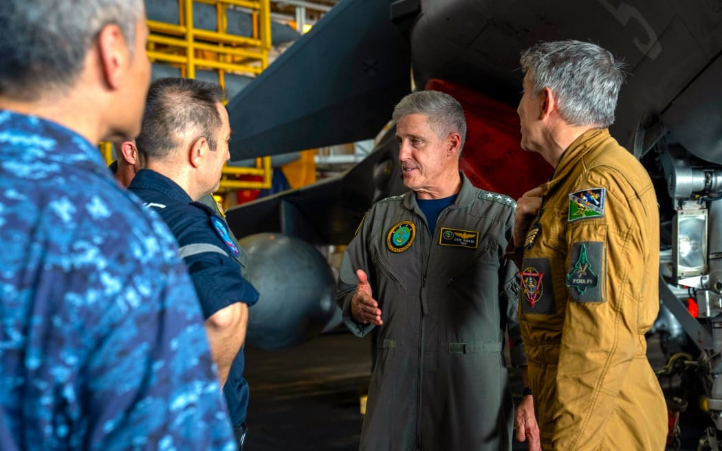 Senior leaders from the US Navy, French Navy, and the Japan Maritime Self Defence Force aboard French aircraft carrier Charles De Gaulle in the Philippine Sea during exercise Pacific Steller 2025 – 14 February 2025