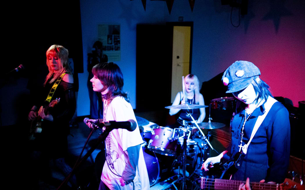 Dunedin's Queens High School band SEEK HELP.