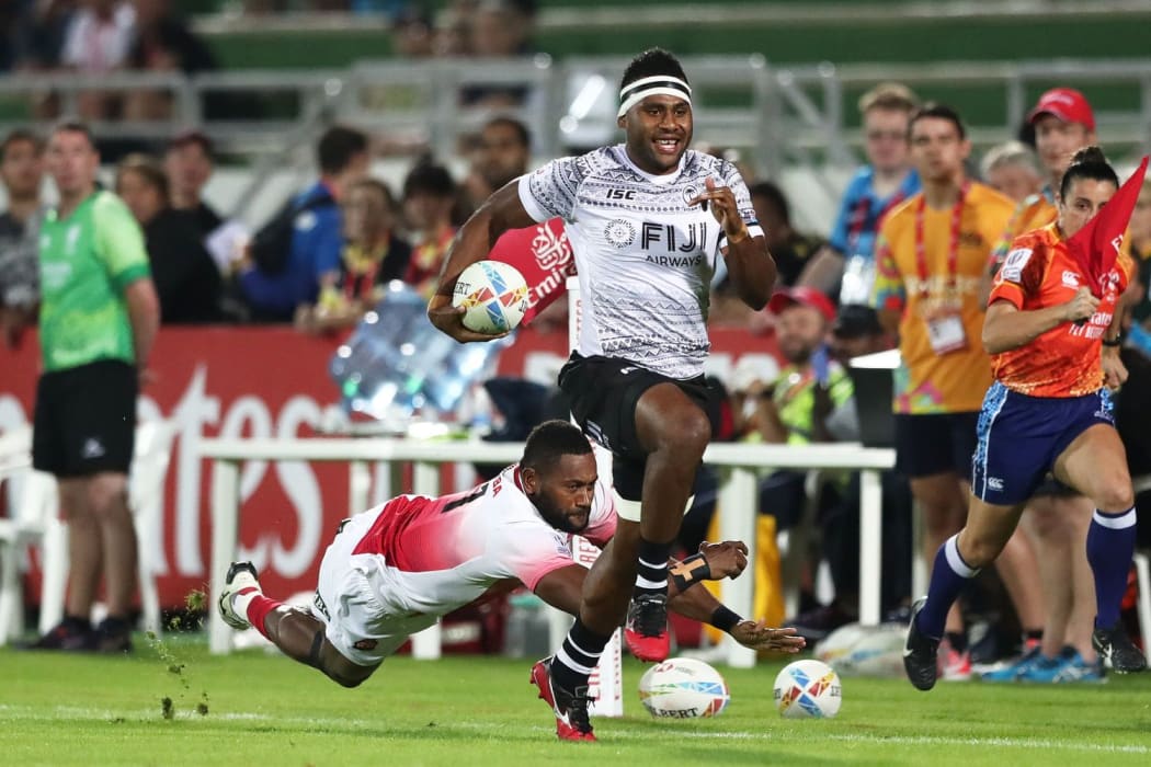 Fiji's Vilimoni Botitu races away against Japan, but his day ended badly with a yellow card and a loss