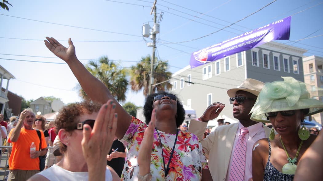 Hundreds gathered both inside and outside the Emanuel African Methodist Episcopal church for the first Sunday service since the shooting.