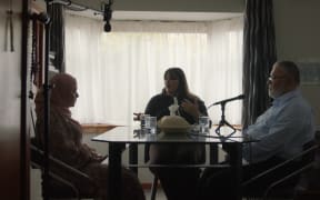 (L-R) Shahd, Wajd, and dad Sameer recording their episode of the podcast