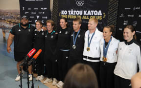 Olympic athletes including Dame Lisa Carrington have arrived at Auckland International Airport from Paris on August 14.