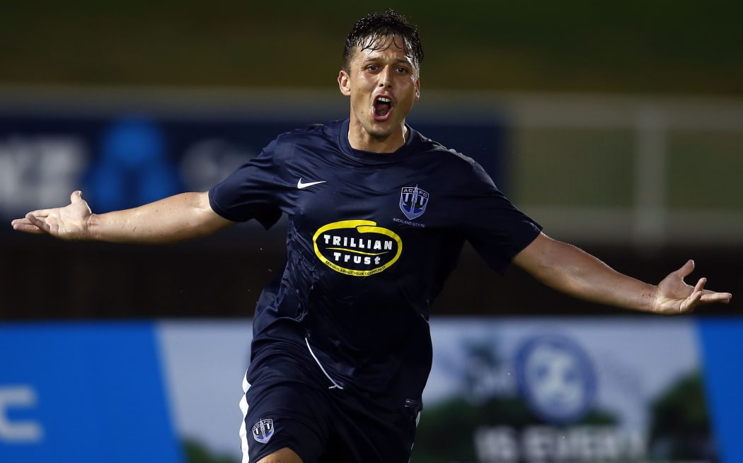 Auckland City's Darren White celebrates his goal.
