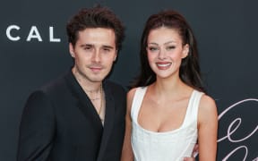 Brooklyn Peltz Beckham and wife Nicola Peltz Beckham arrive at the Los Angeles Premiere Of Vertical Entertainment's 'Lola' held at the Regency Bruin Theatre on February 3, 2024 in Westwood, Los Angeles, California, United States. (Photo by Xavier Collin/Image Press Agency/NurPhoto) (Photo by Image Press Agency / NurPhoto via AFP)